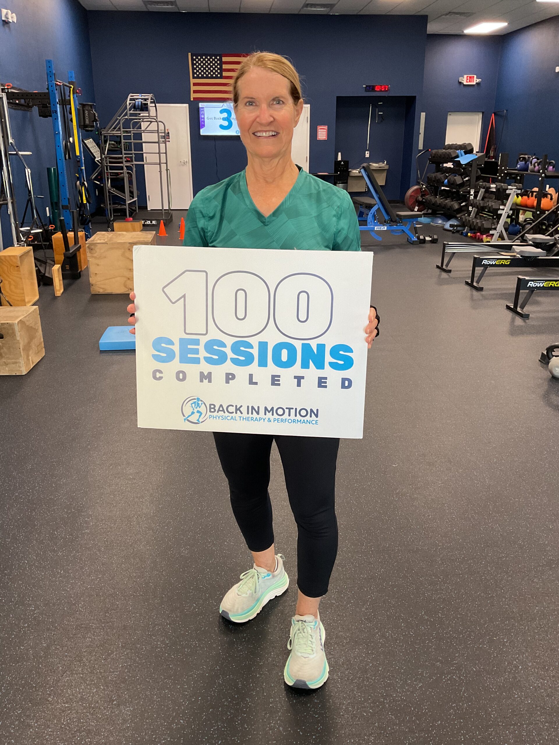 Back In Motion client celebrating 100 training sessions